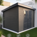 Abris de jardin en lame composite dans un jardin verdoyant.