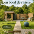 Cabanon écolo au bord de la rivière, intégré dans un jardin verdoyant.
