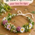 Couronne de fleurs faite maison sur une table en bois, avec des fleurs colorées.