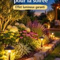 Massif de fleurs illuminé dans un jardin pendant la nuit.